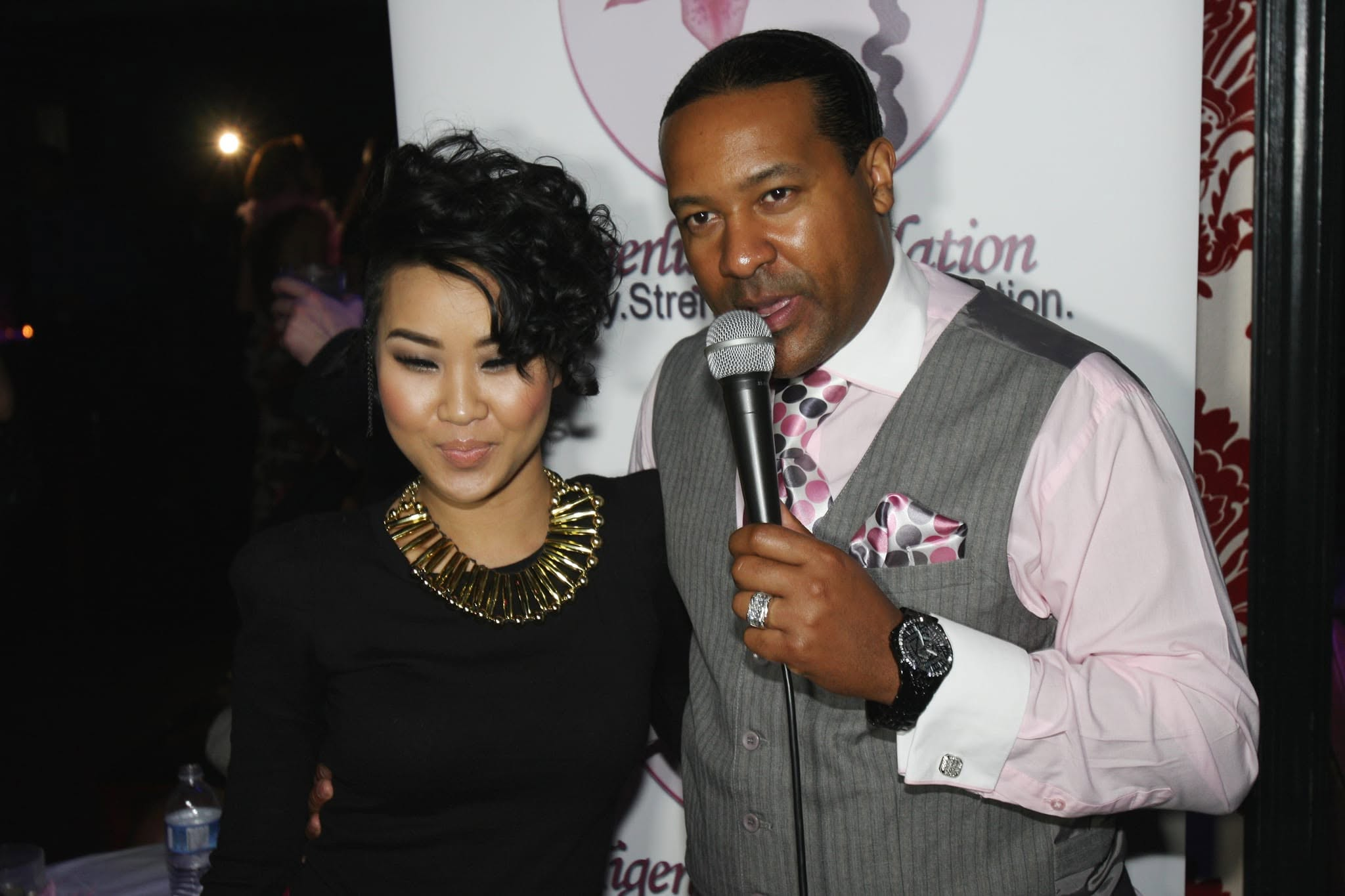 Kevin T. Robertson speaking with a guest at an event