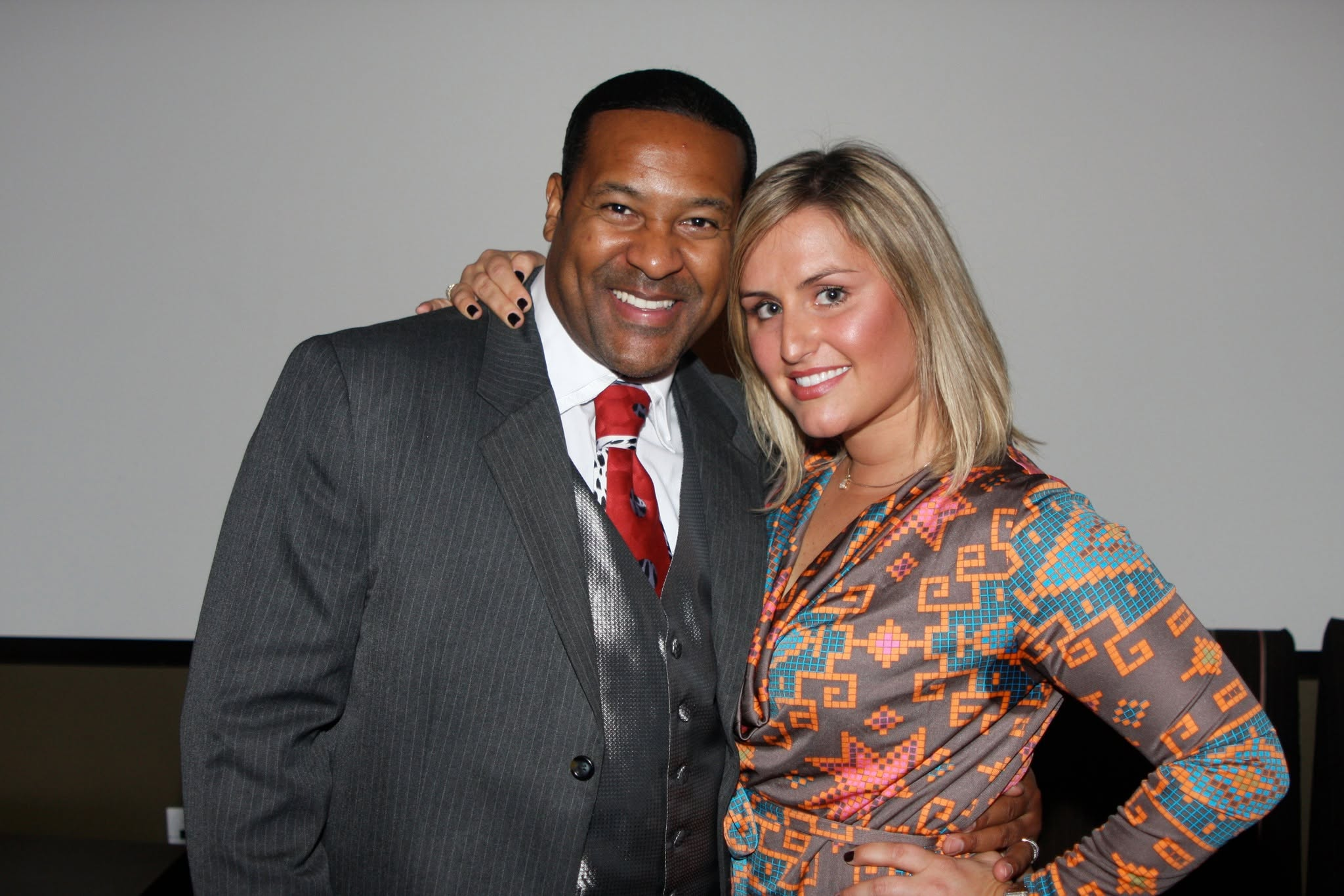 Kevin T. Robertson with an event attendee after a program